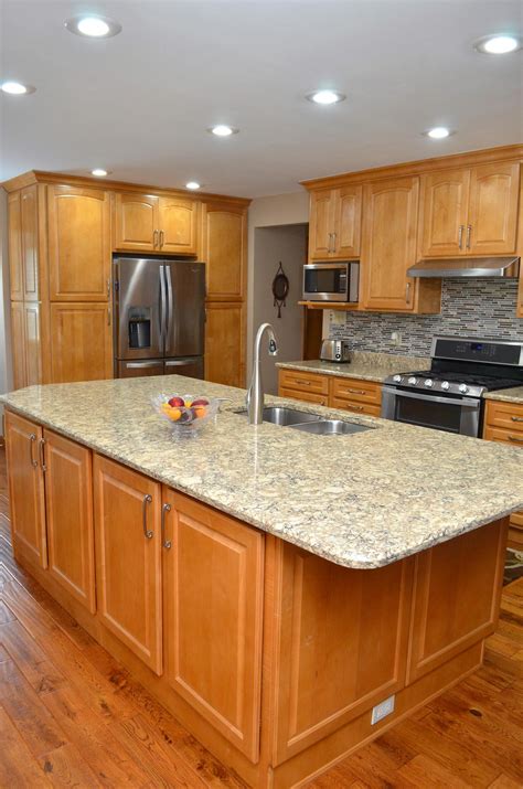 honey maple cabinets with stainless steel and blue pearl granite|honey maple vanity ideas.